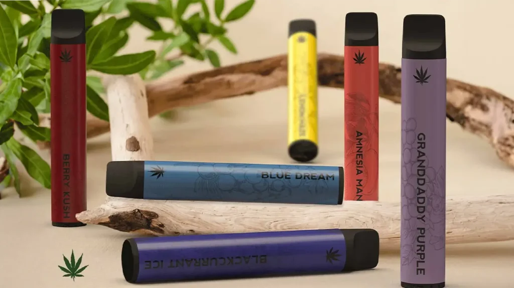 Différentes puffs au CBD de diverses saveurs, telles que Berry Kush, Blue Dream, et Granddaddy Purple, présentées avec un fond naturel. Découvrez quelle puff au CBD choisir pour une expérience de vape relaxante et savoureuse.