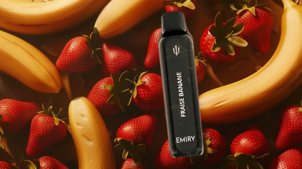 Puff Emiry saveur fraise banane entourée de fraises et bananes, illustrant l'équilibre parfait des saveurs.